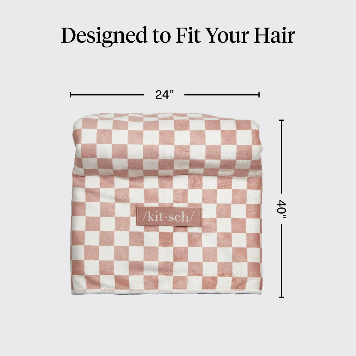 Kitsch folded XL towel beside regular towel showing compact packing advantage