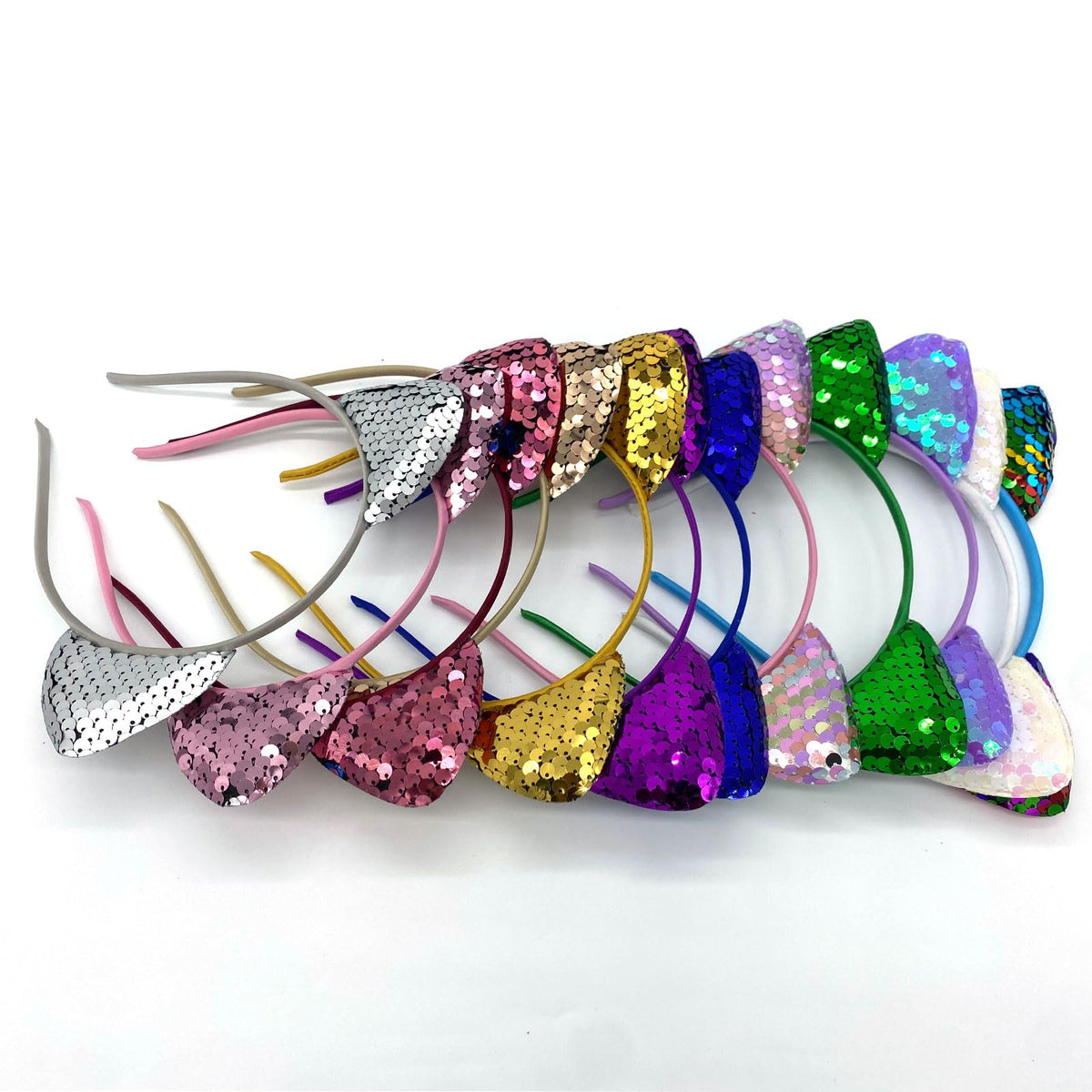 KIUSOWAYD headband beside ruler showing 4.5 by 5.5 inch scale for sizing clarity