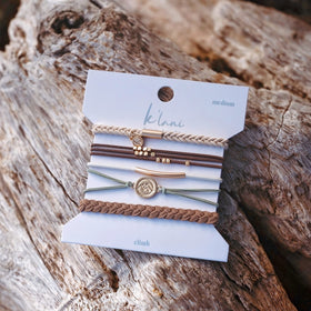 K'lani color-coordinated labels and bands displayed to show easy mix-and-match styling