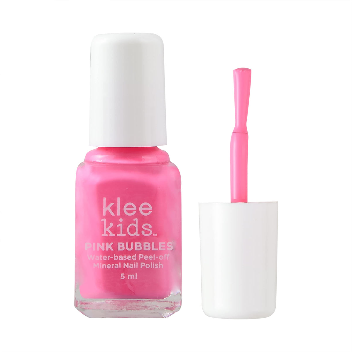 Klee Naturals kit held in child’s hand showing compact size and easy handling