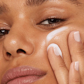 Kleem Organics applying cream under eye demonstrating reduced puffiness