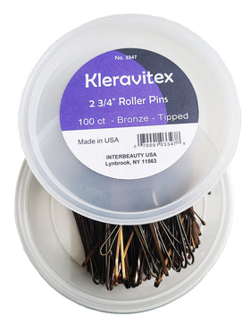 Kleravitex close-up of bronze pin tips showing rubberized ends for snag-free styling