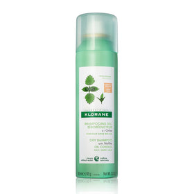 Klorane can front packaging showing nettle tinted dry shampoo benefit of oil control