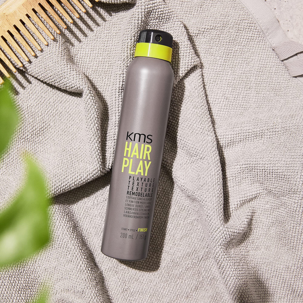 KMS definition at hair lengths after spray offering piecey, matte finish