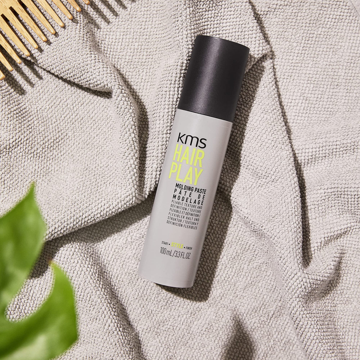 KMS placed on bathroom shelf conveying everyday styling convenience