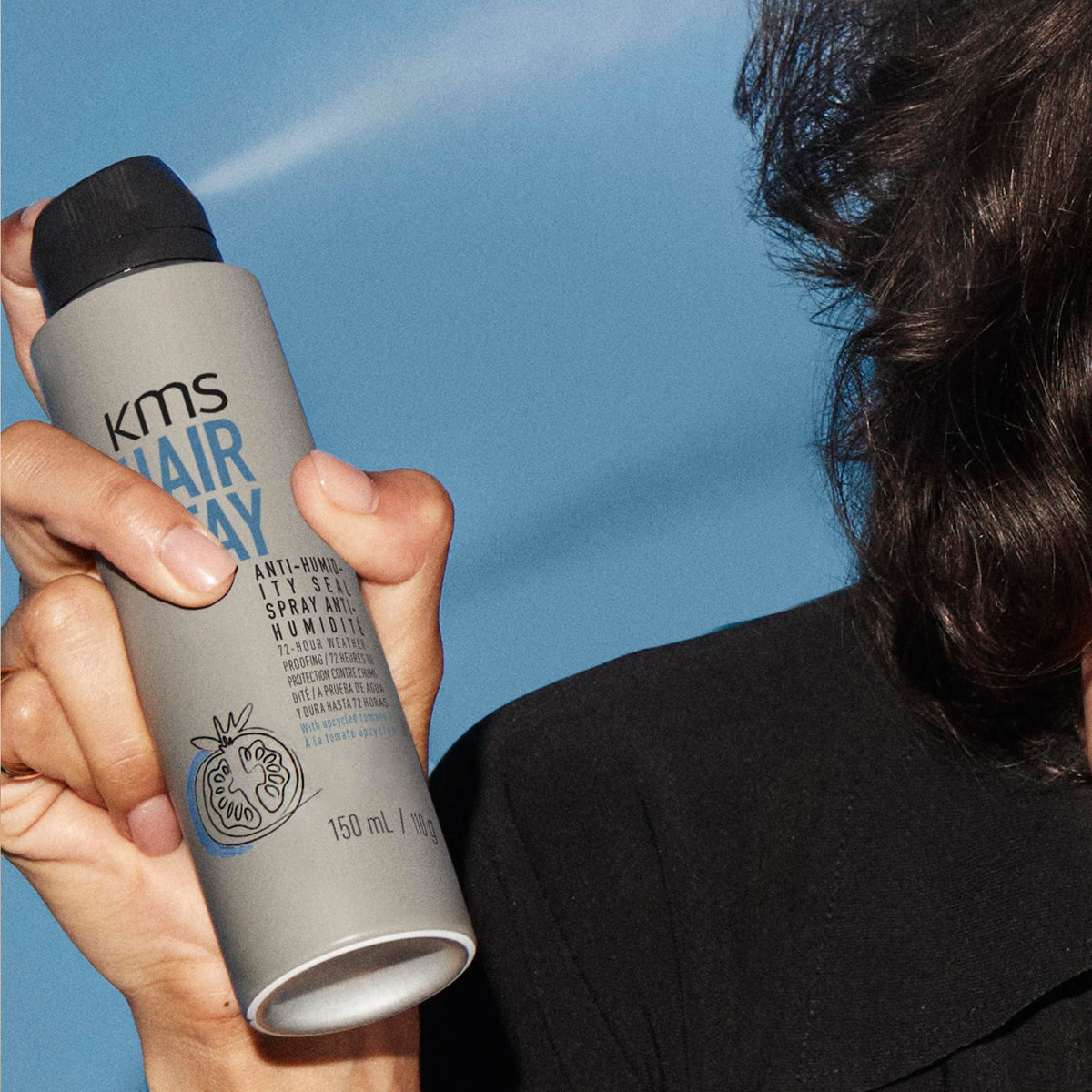 KMS HairStay label highlighting upcycled tomato ingredient and antioxidant environmental protection