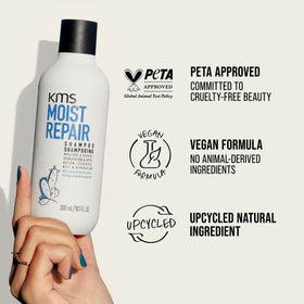 KMS MoistRepair bottle on bathroom shelf lifestyle shot conveying daily haircare ritual