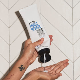 KMS MoistRepair styled dry hair in lifestyle shot showing softer, healthier-looking finish