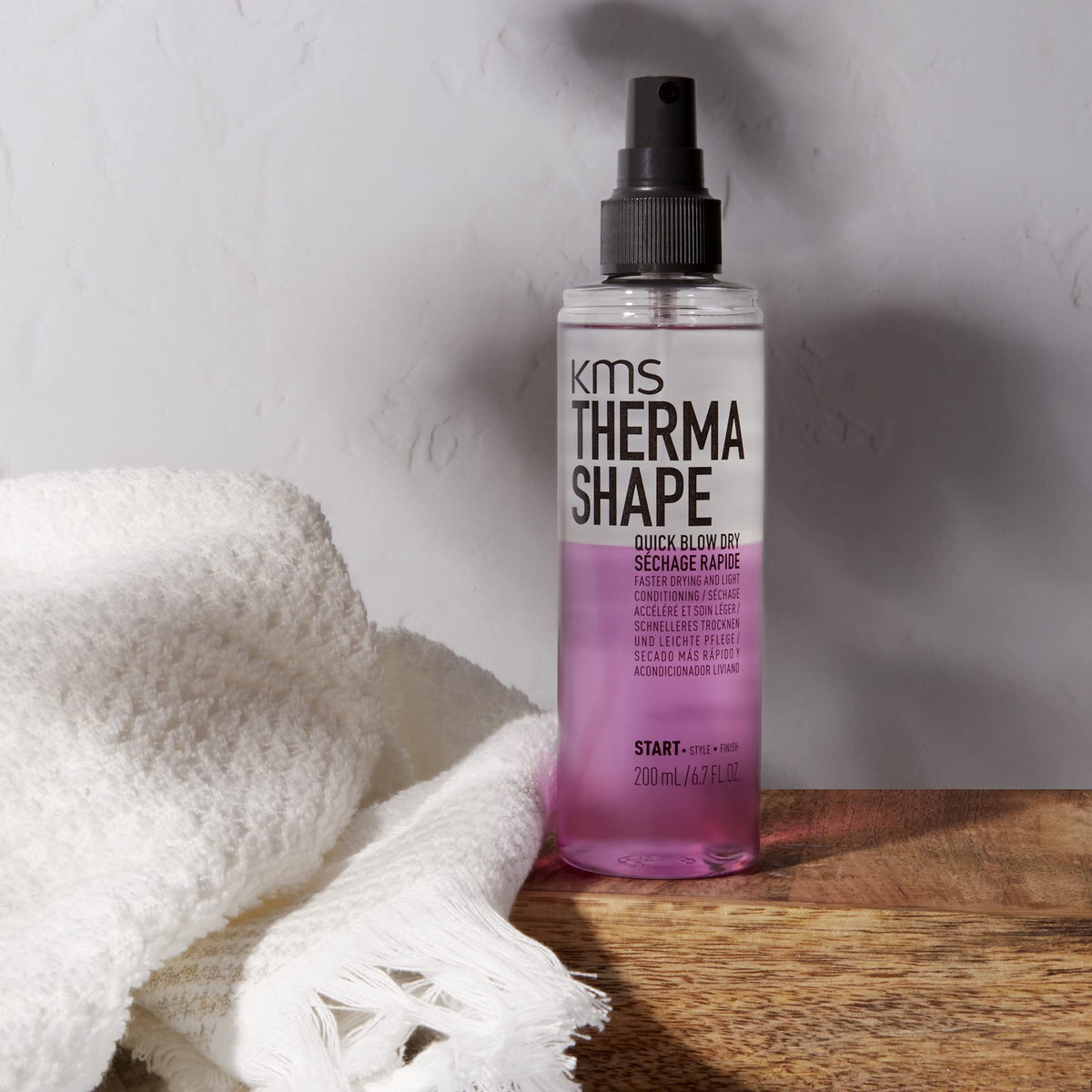 KMS spray applied to towel-dried hair for quicker blow-drying