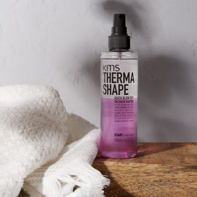 KMS spray applied to towel-dried hair for quicker blow-drying