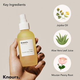 Knours bottle with aloe and jojoba flatlay highlighting natural ingredients