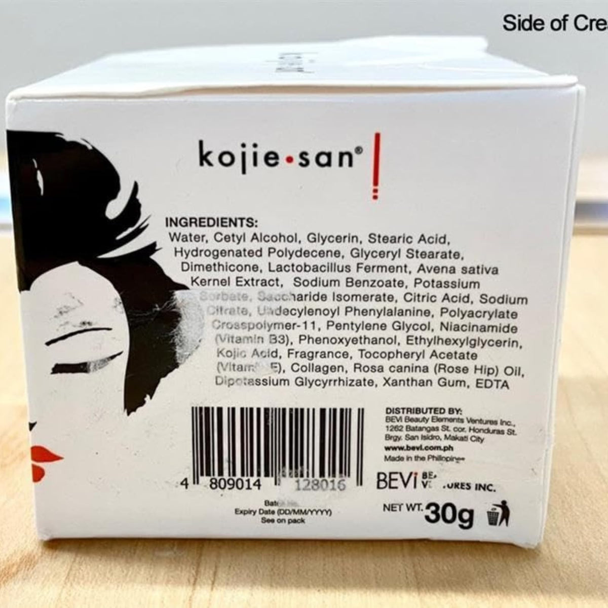 Kojie San soap in hand for scale demonstrating compact travel-friendly benefit