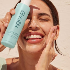 Kopari bottle on bathroom counter illustrating daily skincare routine use