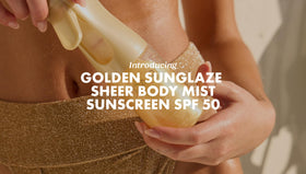 Kopari on model arm showing glowy skin finish and hydrated look benefit