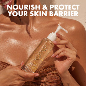 Kopari bottle next to hand showing 3.3 oz size and travel-friendly benefit