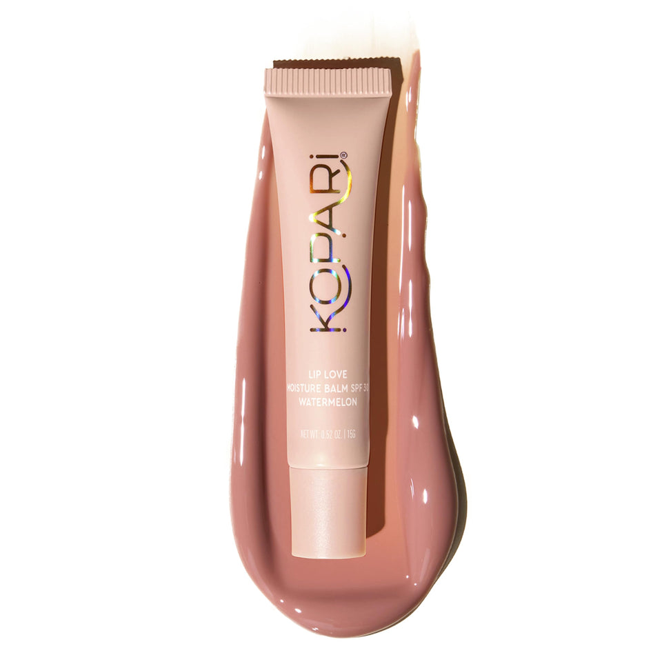 Kopari front view of stick showing label and compact size for travel
