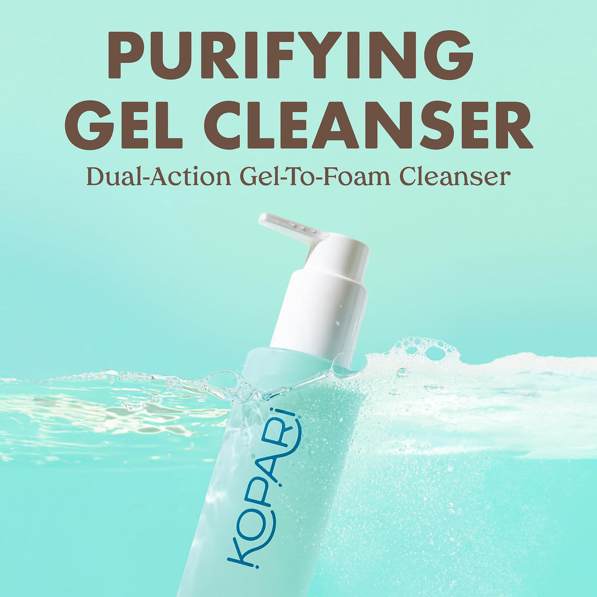 Kopari dispenser pumping clear gel-to-foam cleanser for easy application