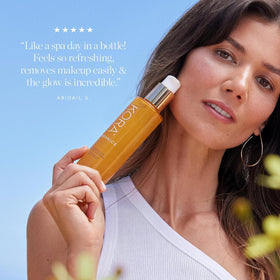 KORA Organics foaming cleanser on hands in use, shows easy application and rinsing benefit