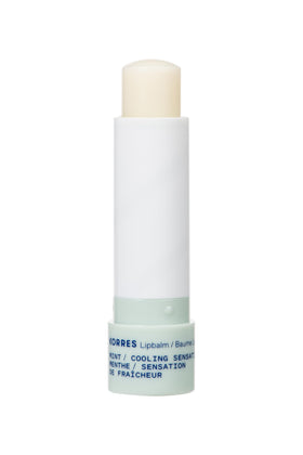KORRES close-up of balm tip texture demonstrating creamy finish and precise application