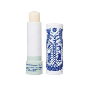 KORRES lifestyle image of application on lips showing refreshing mint effect and subtle shine