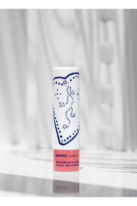 KORRES lip butter applied on lips demonstrating soft tint and immediate hydration