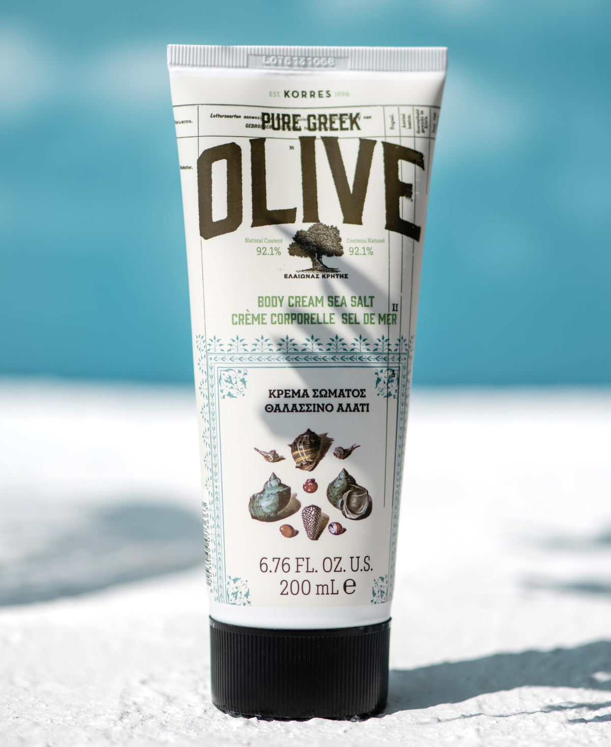 KORRES ingredients display with olive oil and aloe, natural nourishing benefit