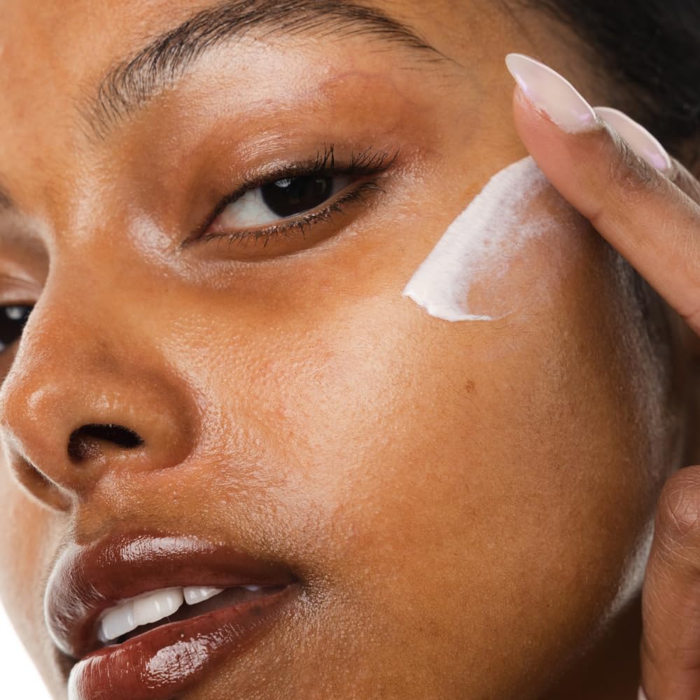 KORRES travel-size tube in a makeup bag signaling portability and on-the-go reapplication