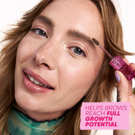 Kosas Air Brow being applied to model brows for natural volumizing effect