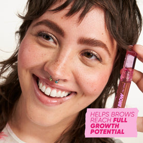 Kosas being applied to model brows for natural lift and definition