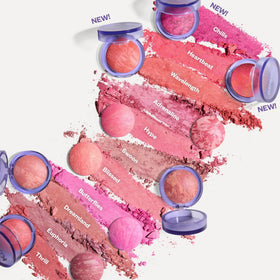 Kosas applying blush with brush on cheek demonstrating blendability benefit: smooth coverage