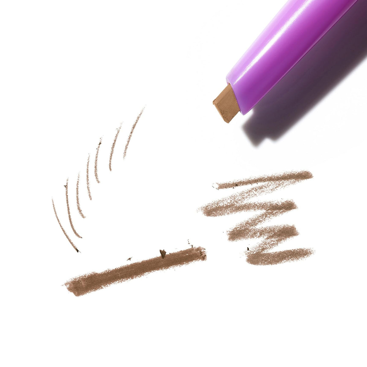 Kosas Brow Pop integrated spoolie brush blending pigment smoothly
