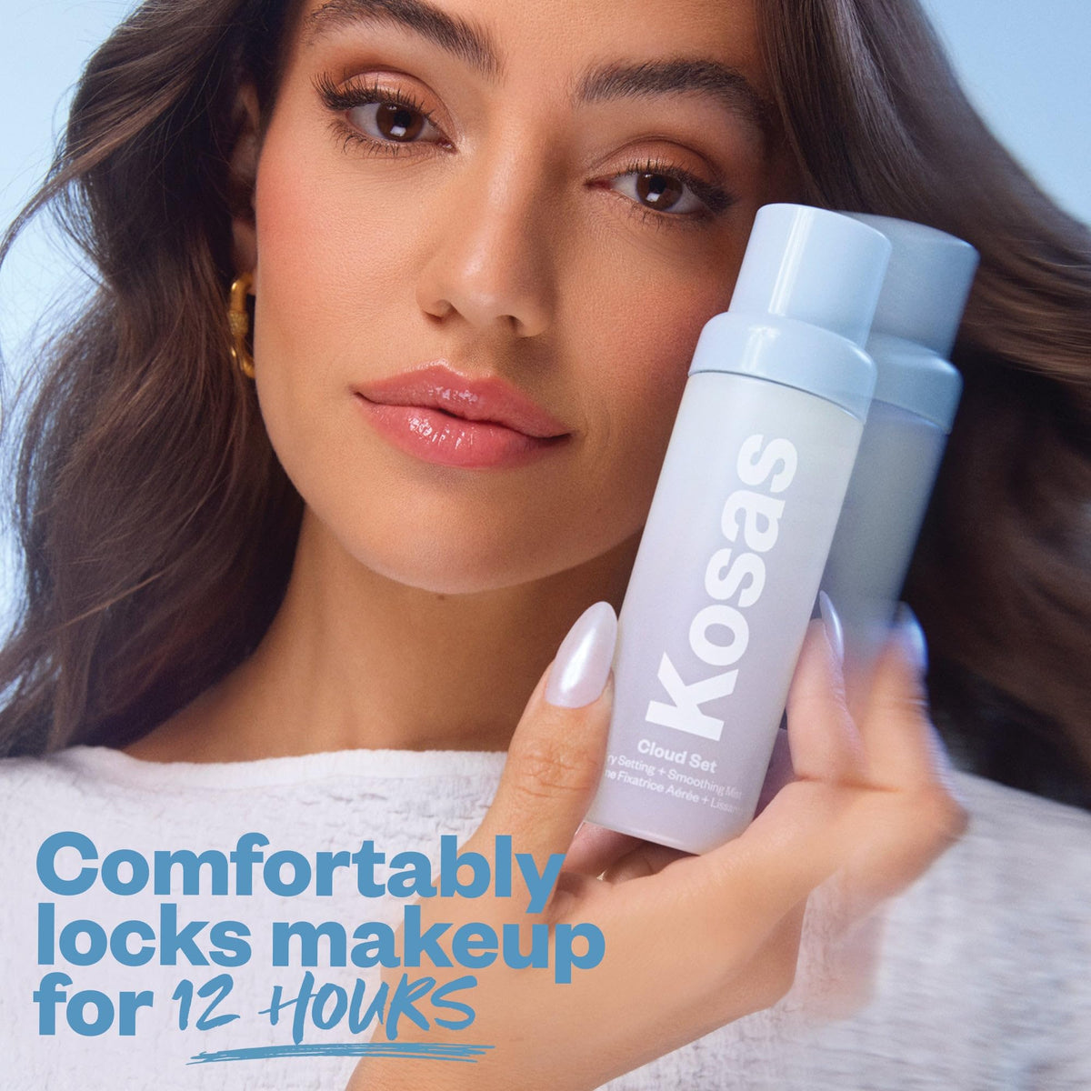 Kosas bottle held in hand to show size and travel-friendly convenience
