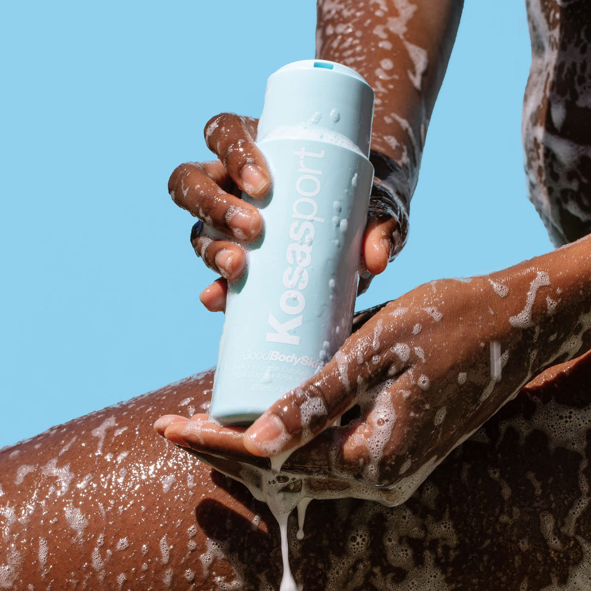 Kosas Good Body being dispensed from pump highlighting easy application benefit