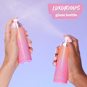 Kosas bottle in hand for scale showing travel-friendly size and easy application benefit