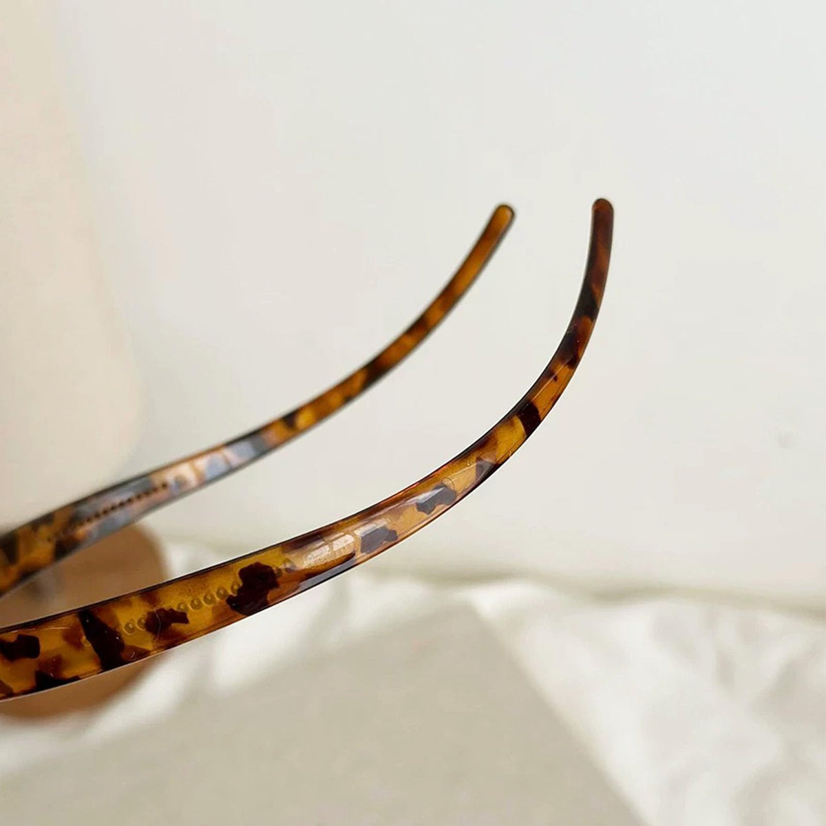 KOVOLITU leopard headband styled with outfit for fashionable, functional look