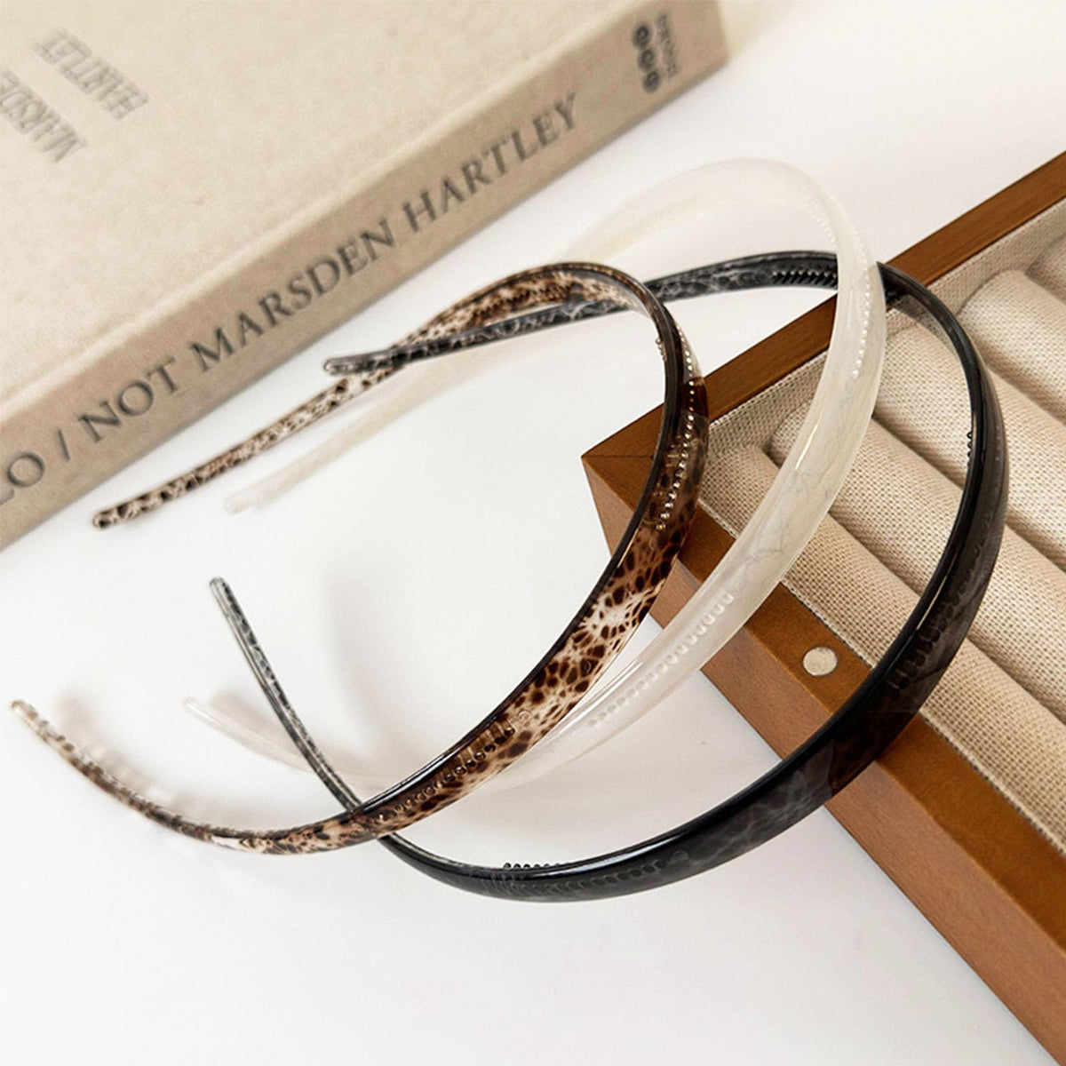 KOVOLITU headband in bathroom during skincare routine showing convenience
