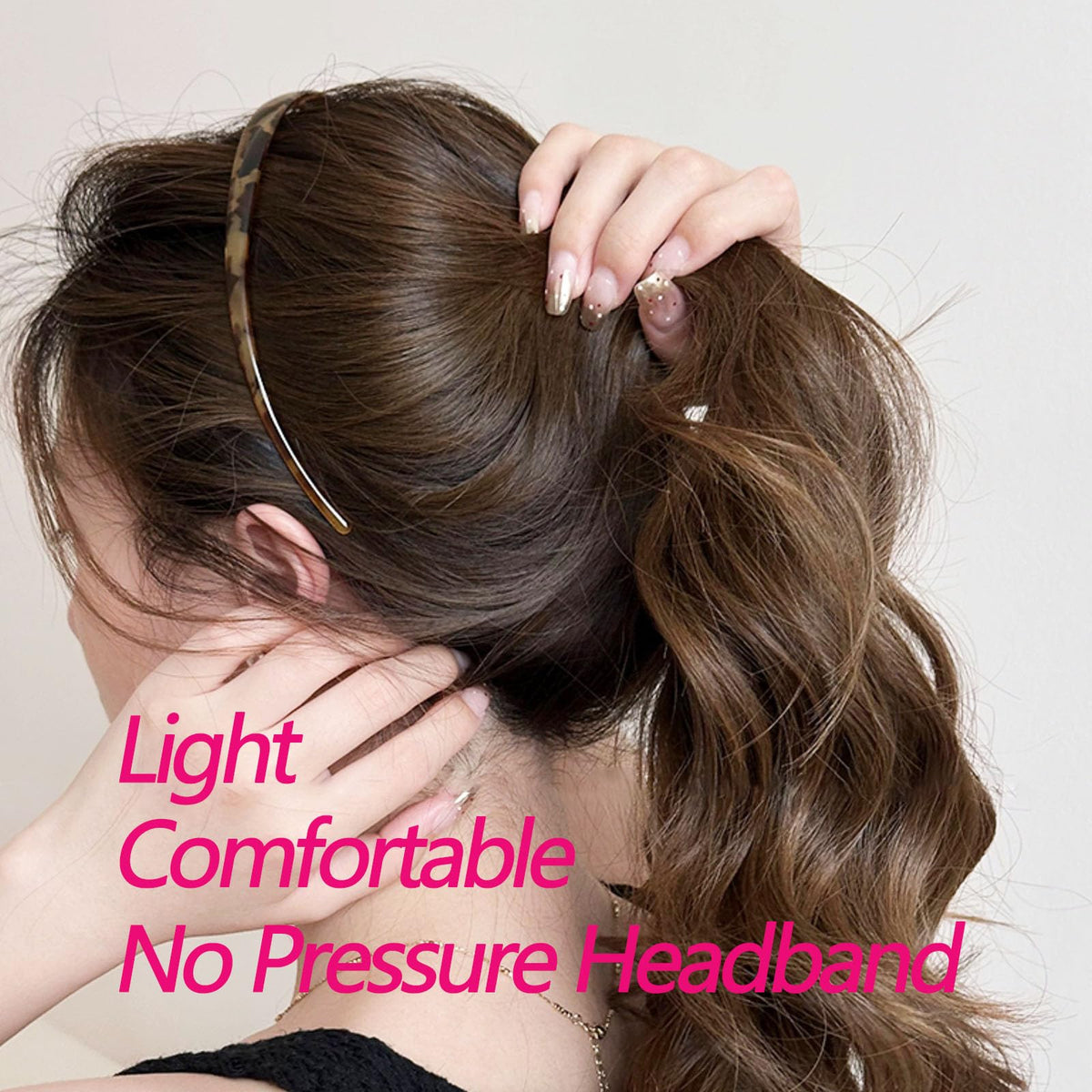 KOVOLITU headband held in hand to show compact size and portability
