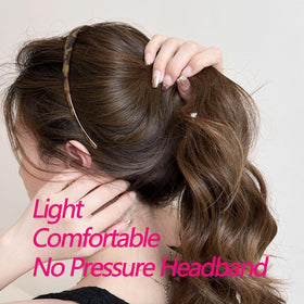 KOVOLITU headband held in hand to show compact size and portability
