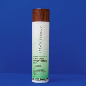 Kreyol Essence ingredient layout with Haitian black castor and coconut highlighting natural sources