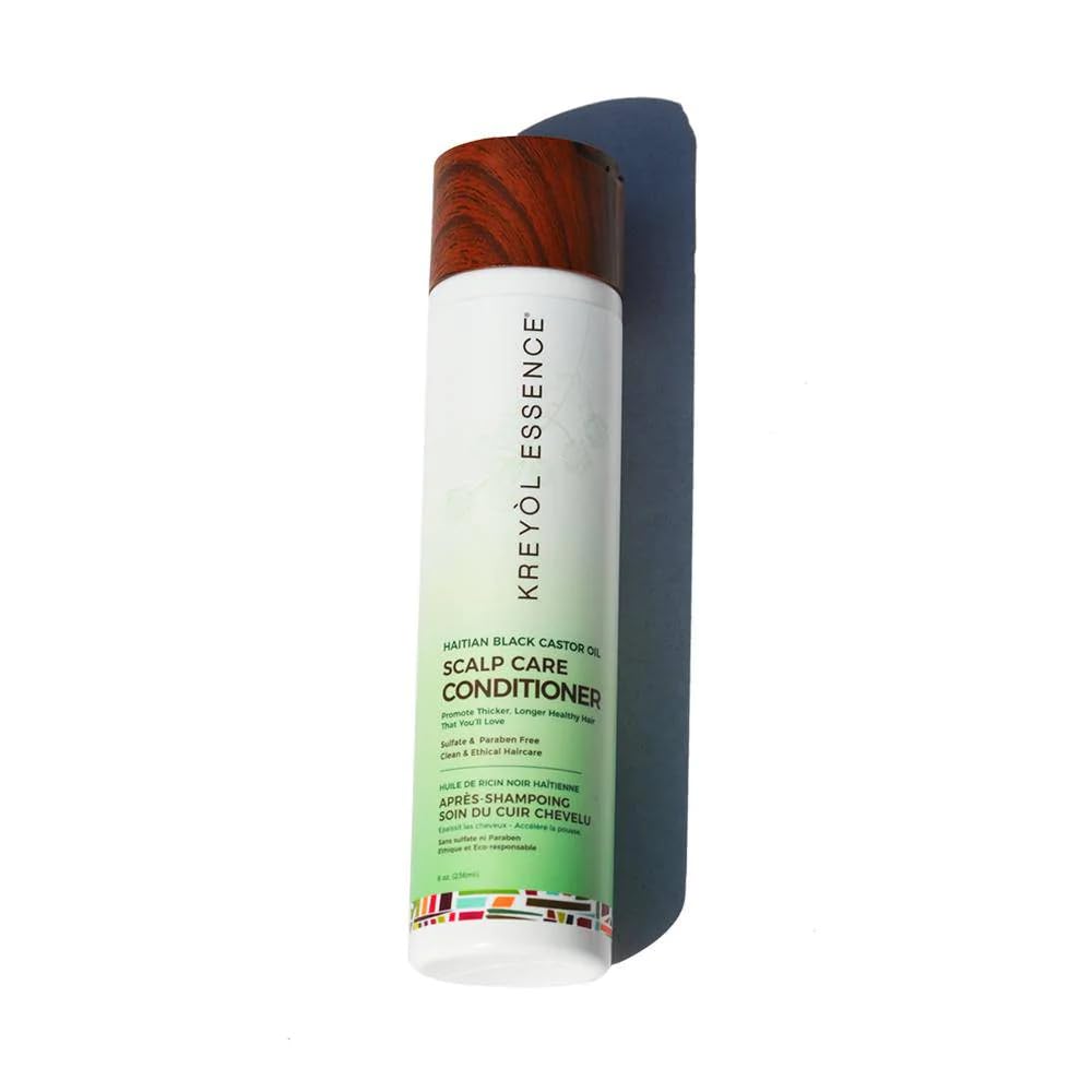 Kreyol Essence open cap with creamy conditioner texture illustrating slip
