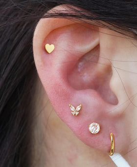 KRFY lifestyle image with person using kit demonstrating easy at-home piercing