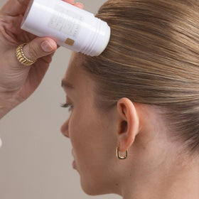 Kristin Ess application on hair ends demonstrates moisture restoration