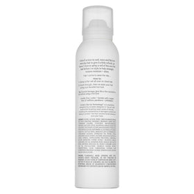 Kristin Ess balm stick texture close-up highlights creamy glide
