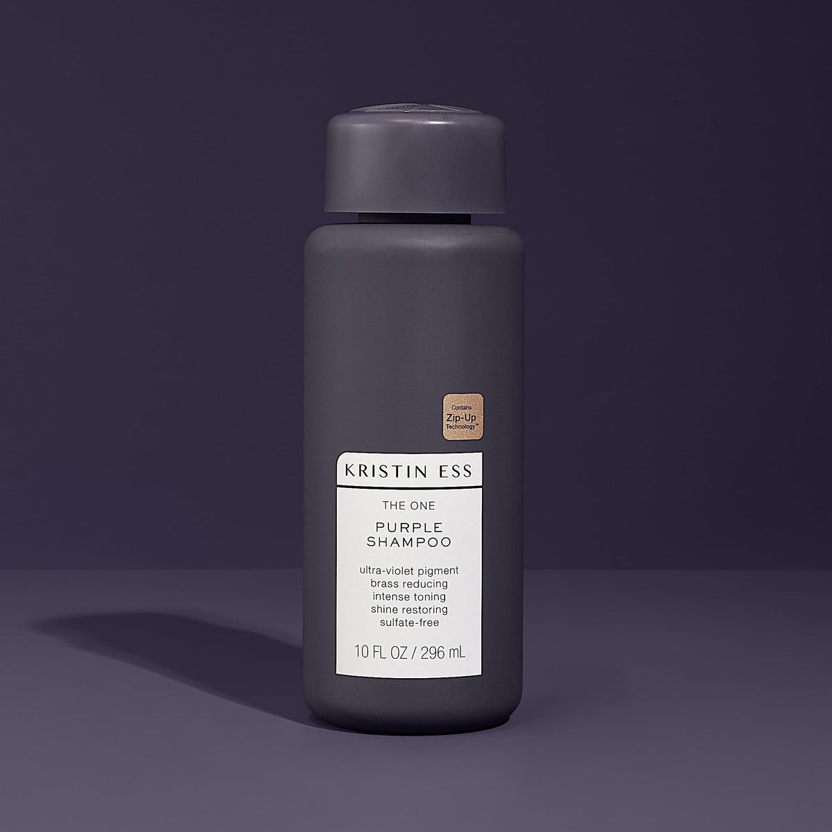 Kristin Ess shampoo staged on bathroom shelf for a polished routine