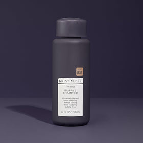 Kristin Ess shampoo staged on bathroom shelf for a polished routine