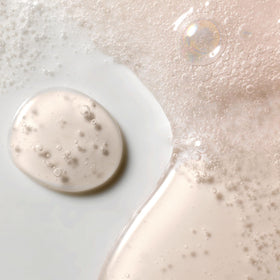 Side ingredient panel on Kristin Ess bottle highlighting gentle, color-safe formulation