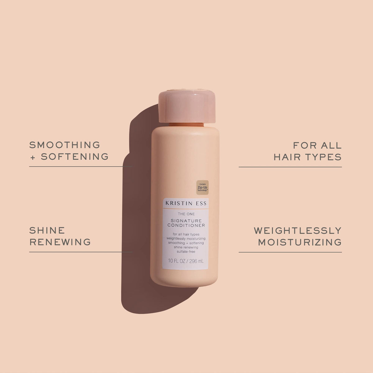 Kristin Ess conditioner cream texture demonstrating moisturizing slip