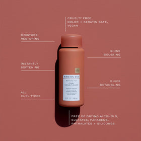 Kristin Ess conditioner applied to wet hair for easy detangling