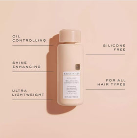 Close-up of Kristin Ess Lightweight Balancing Conditioner pump showing texture and dispensing control