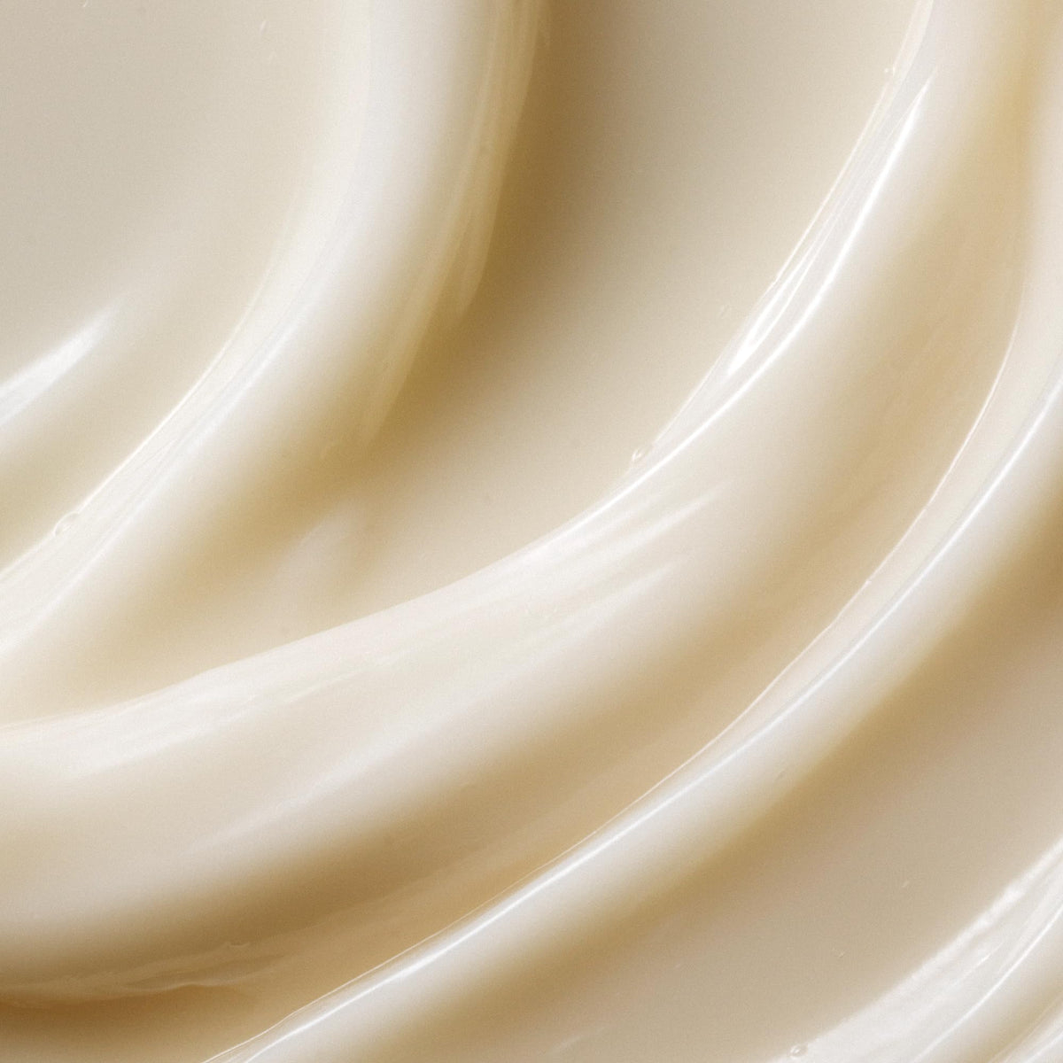 Kristin Ess creamy texture closeup demonstrating moisturizing slip